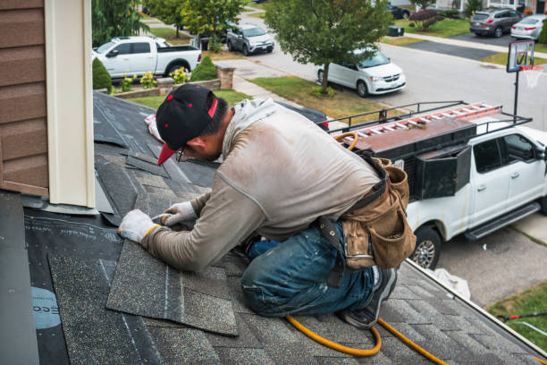 Professional Flat Roof Repair technician working in Lexington, TX